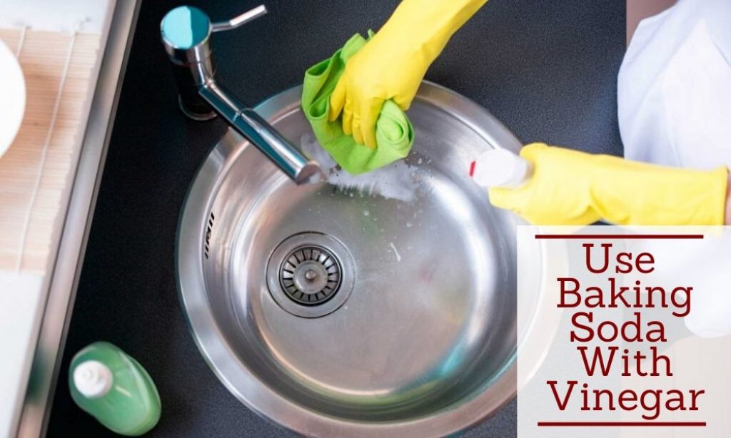 cleaning kitchen sink drain with baking soda and vinegar